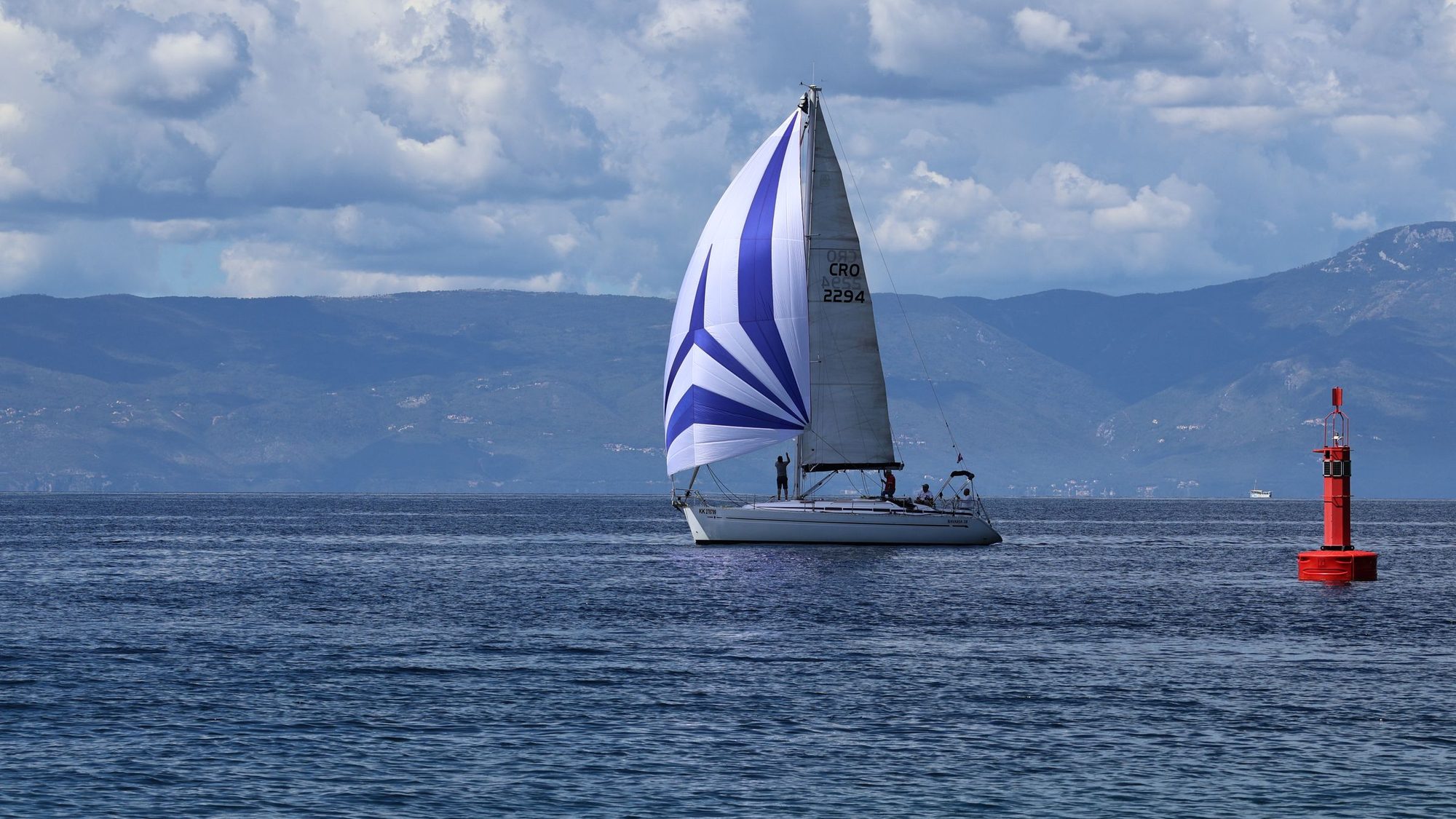 A sailing boat running downwind